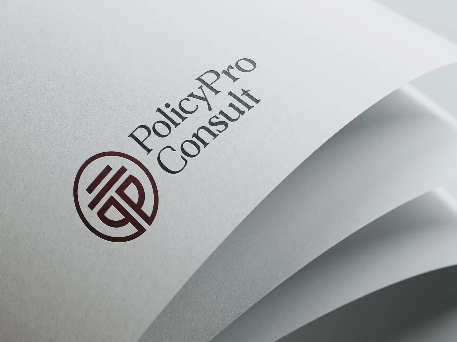 Gold corporate shield emblem embedded in clean cardboard matrices.